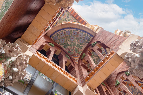 Facade of Palau de la Música Catalana. The mission the Foundation is to promote music, particularly choir singing, knowledge and dissemination of cultural heritage and opera in Barcelona, spain photo
