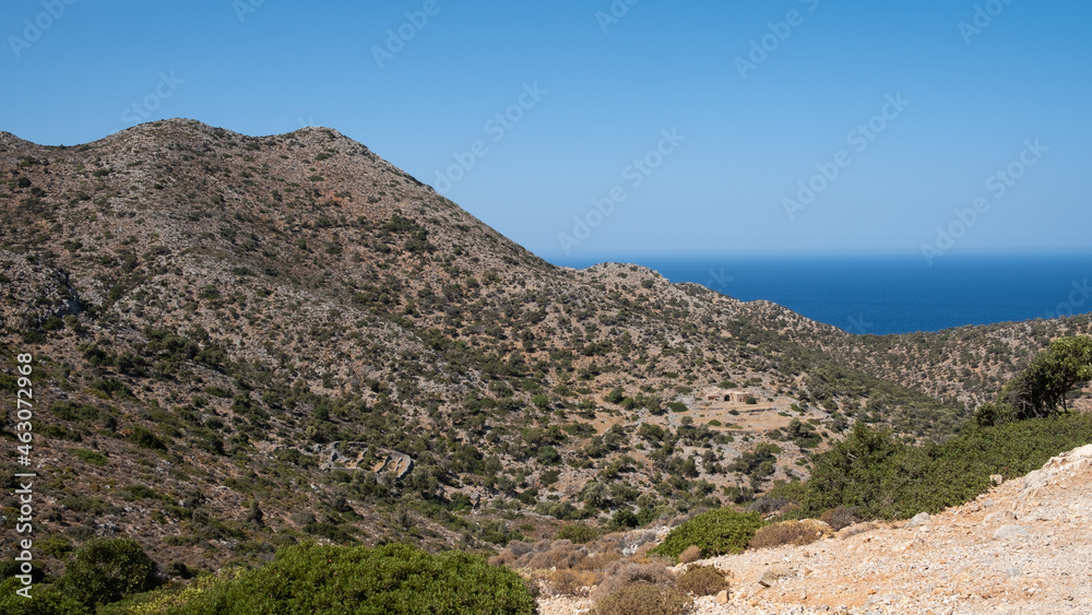 Scenic view on a rocky landscape and sea of Crete in summer Scenic view on a rocky landscape and sea of Crete in summer