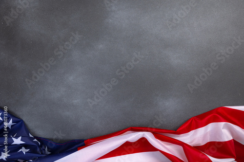 Vintage american flag on grunge background with space for text © Nana_studio