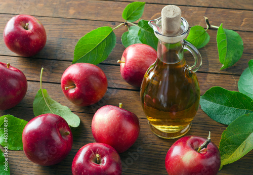 Ripe apples and apple cider vinegar