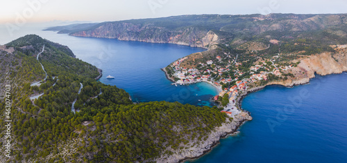 Aerial panoramic view of Assos in island of Cefalonia, Ionian, Greece. Aerial drone photo of beautiful and picturesque colorful traditional fishig village