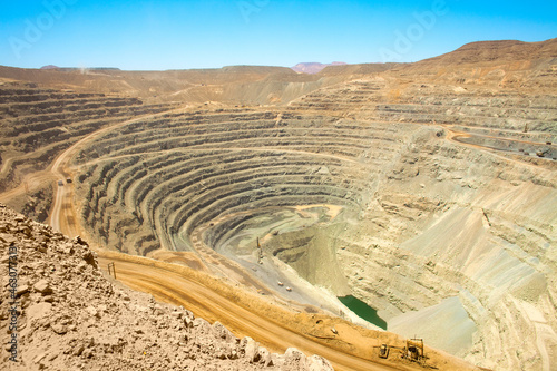 View from above of the pit of an open-pit copper mine in Chile photo
