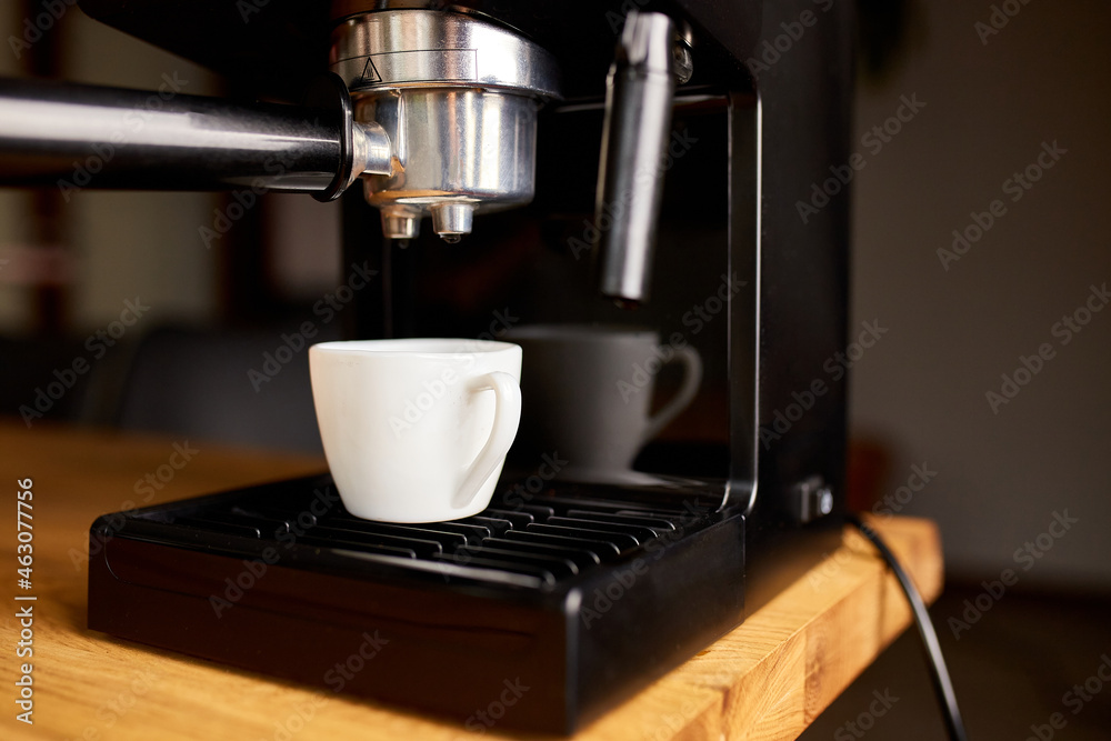 Coffee Maker Ready To Preparing A Coffee. Cup Of Coffee Being Prepared Using An Espresso Machine In A Cafe. Coffee Maker Ready To Preparing A Coffee. Cup Of Coffee Being Prepared Using An Espresso Machine In A Cafe.