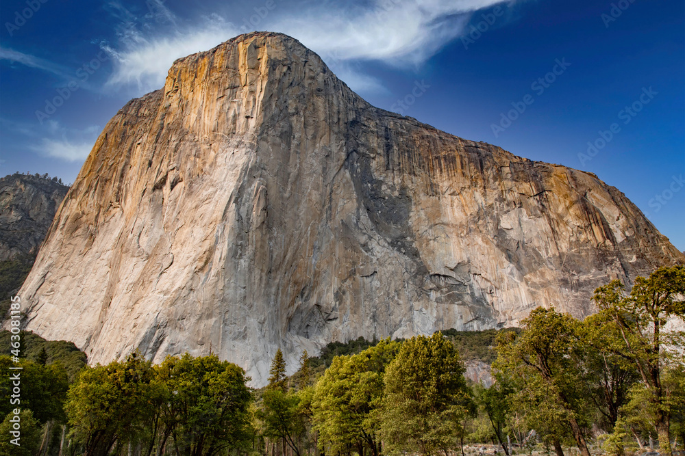 El Capitan in Yosemite National Park in California, against a deep blue sky.