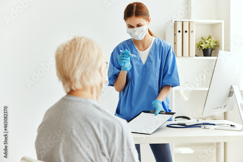 nurse and patient Hospital visit medical masks