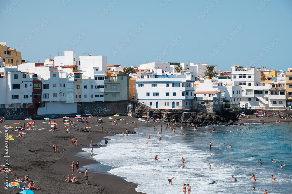 People at beach in Puerto de la Cruz, Tenerife,