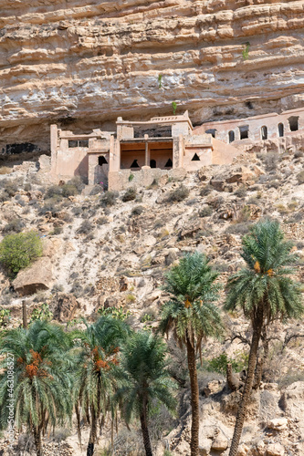 Scenic view of Old stone houses, Palm trees Oasis , Mountains from Ghoufi Canyon in the Aures region, Algeria