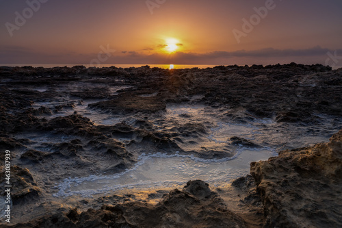 Sunrise over the rocky coast of the Mediterranean Sea © Игорь Кляхин