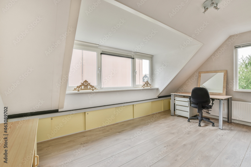 Spacious room interior with table and armchair at home