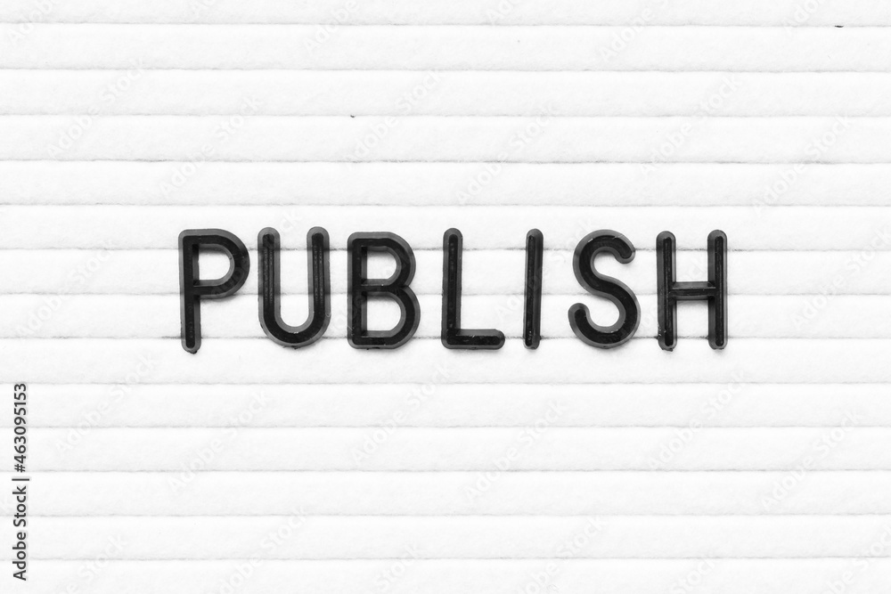 Black letter in word publish on white felt board background Black letter in word publish on white felt board background