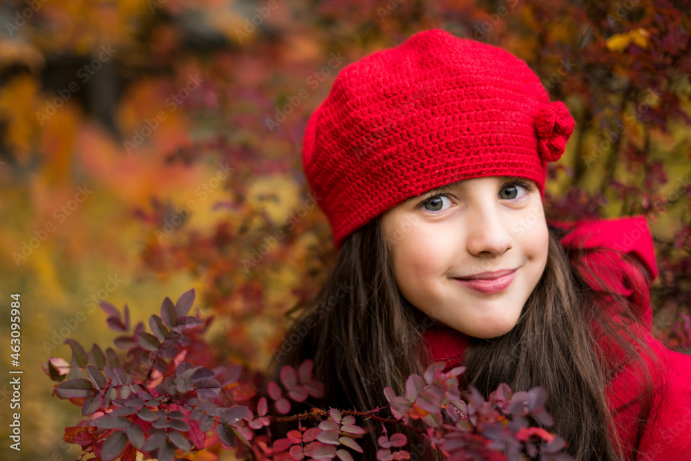 Beautiful girl in sunny autumn park. Child playing in park at autumn. Autumn mood. Beautiful girl in sunny autumn park. Child playing in park at autumn. Autumn mood.