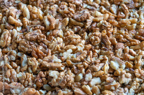 Background, texture of peeled walnuts close-up