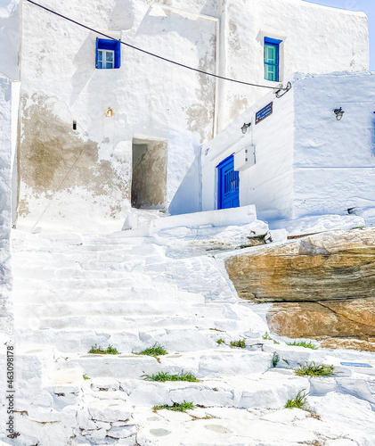 Traditional greek architecture, Stairs, whitewashed walls and blue doors at Kastro village