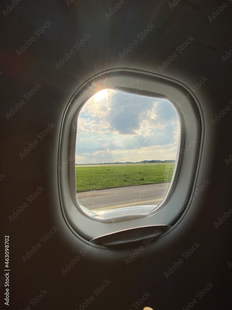 Airport Airfield seen through an airplane window before takeoff or after landing