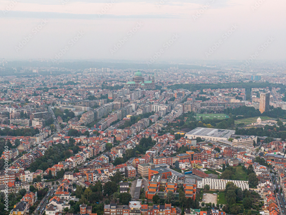Aerial panorama view of Brussels-Capital Region and suburban area in the foreground. View from Ganshoren municipality during grey sunset