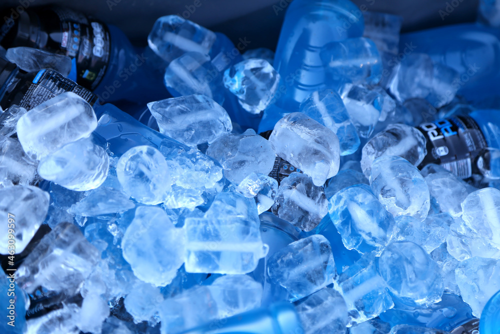 Ice. Cold drinks. Drinks on ice. Powerade energy drink. Blue bottle