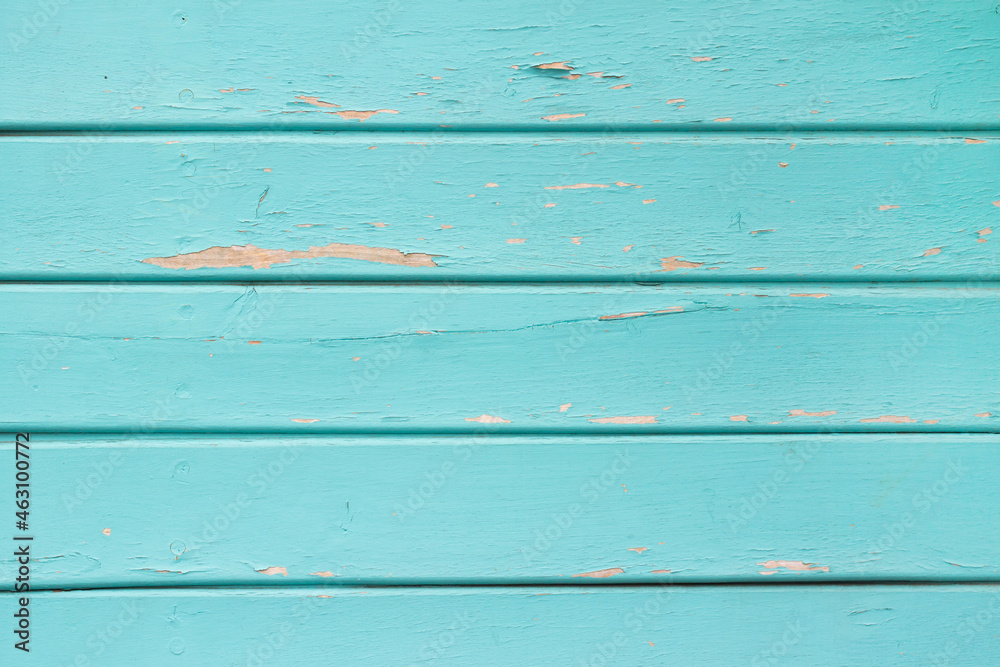 Naklejka premium Texture photo of horizontal worn blue paint colored wooden boards.