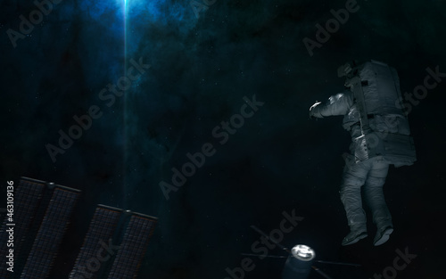 Fototapeta Naklejka Na Ścianę i Meble -  Astronaut against the background of deep space nebulae. Space station blurred in motion. Science fiction. Elements of this image furnished by NASA