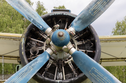 engine cylinders and propeller of an old propeller plane