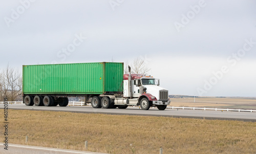Heavy Cargo on the Road. A truck hauling freight along a highway