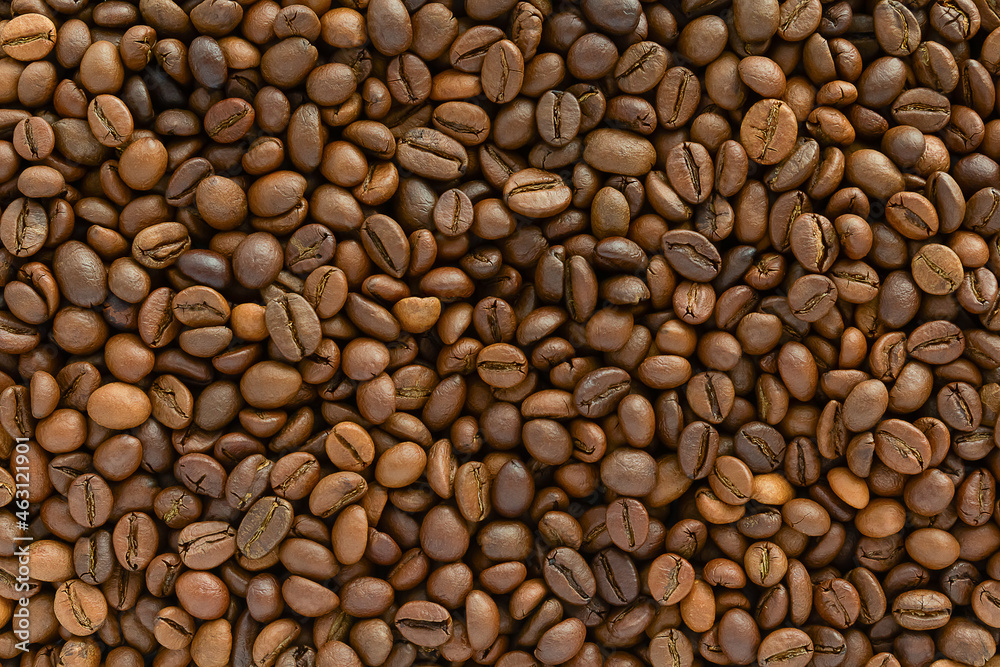 Brown background from coffee beans, natural coffee Brown background from coffee beans, natural coffee