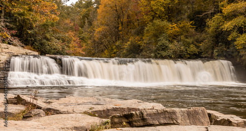 waterfall in autumn forest
