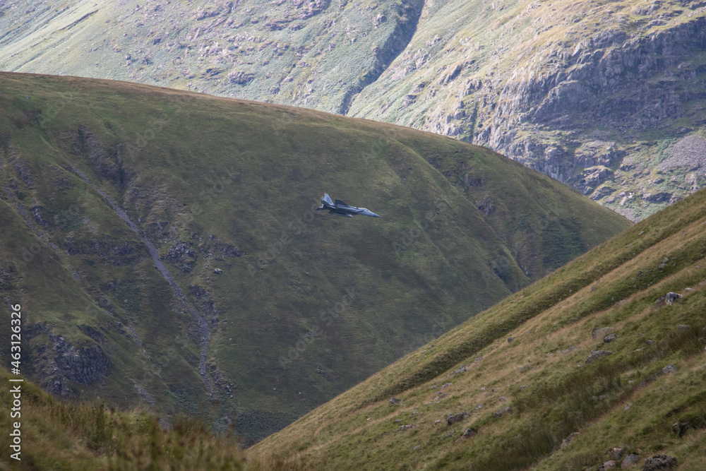 Fighter Jet through the mountains