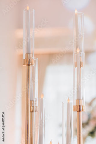 wedding decoration. white candles. © ALEXSTUDIO