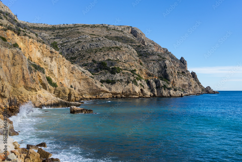 View of the blue mediterranean sea and limestone cliffs beautiful mountain landscape in Spain