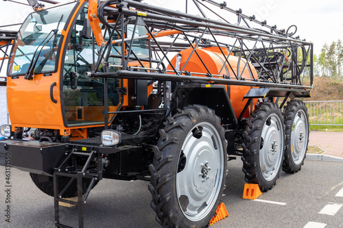 Machine for spraying pesticides and herbicides in the field