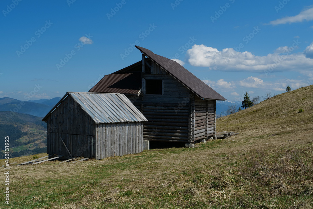 Wooden house and shed in the mountains