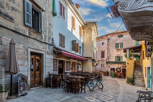 Image of the historical center of the Croatian coastal town of Porec in the morning light during the sunrise photo