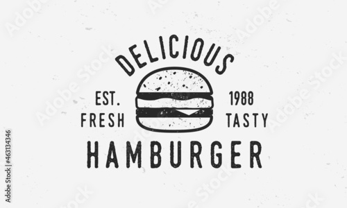 Hamburger vintage logo, poster. Vintage burger cafe logo with grunge texture. Trendy vintage design. Vector illustration