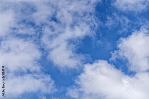 White clouds in the blue sky background