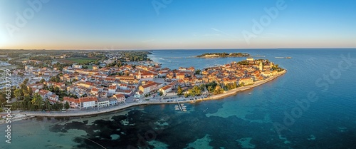 Fototapeta Naklejka Na Ścianę i Meble -  Drone panorama of Croatian coastal town Porec with harbor and promenade during sunrise