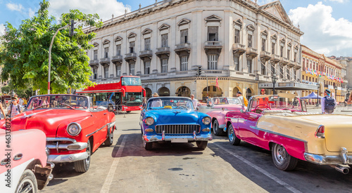Old retro cars on the parking in the historic center of old Havana, Cuba photo