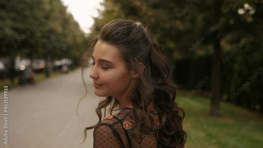 Fashion Walking Woman Portrait in Black Dress Fashion Walking Woman Portrait in Black Dress