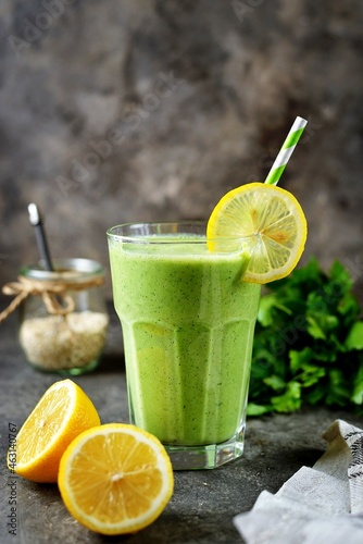 Healthy smoothie with cucumber, parsley, oatmeal and lemon juice.

