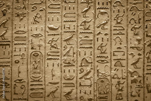 Hieroglyphics of ancient Egypt carved on sandstone wall