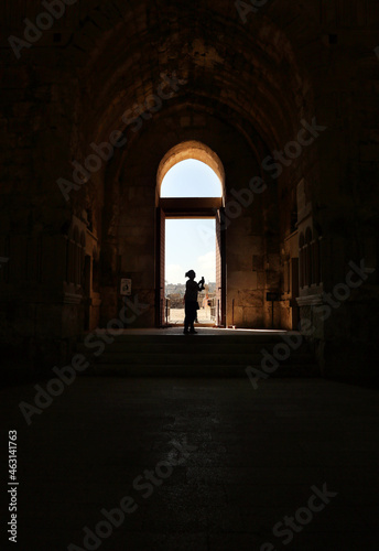 silhouette of a person in a monument