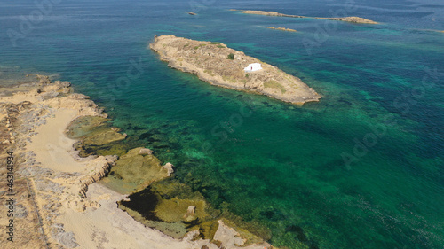 Aerial drone photo of small islet and chapel of Agios Ermolaos, Skyros island, Sporades, Greece photo