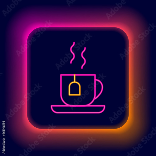 Glowing neon line Cup of tea with tea bag icon isolated on black background. Colorful outline concept. Vector