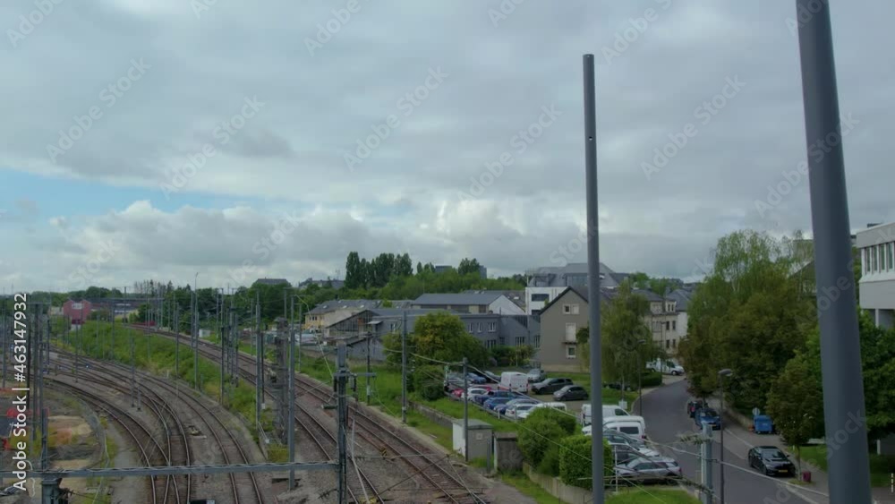 Flying above the streets of Luxembourg on top of a bus on a cloudy day in summer Flying above the streets of Luxembourg on top of a bus on a cloudy day in summer