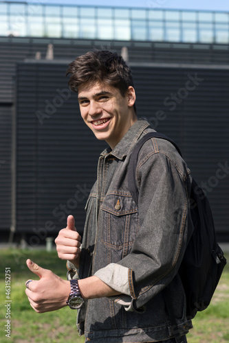Student Boy Giving Thumbs Up Like Approval photo