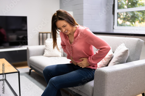 Fotografie Sick Woman With Abdominal Pain