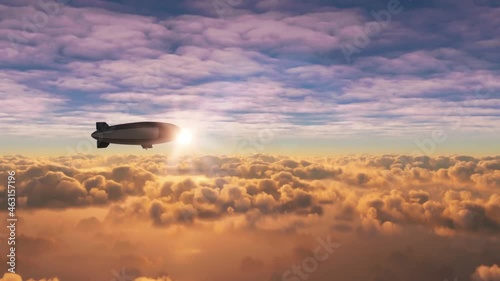 Helium blimp flying above clouds at sunset
