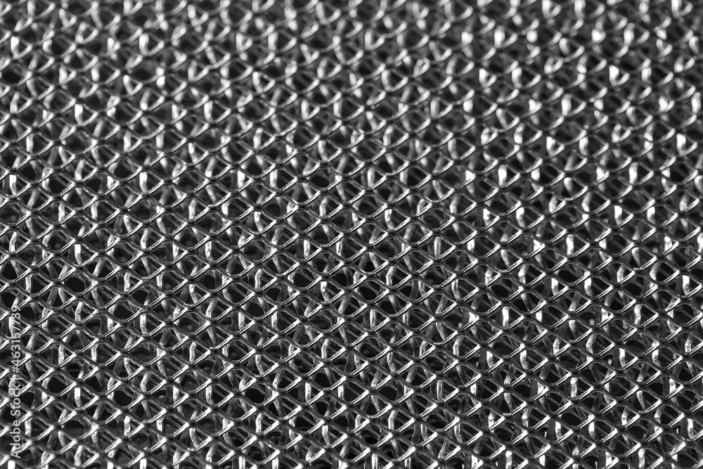 Filtration mesh for the kitchen hood. Mesh texture close-up. Fine steel mesh Filtration mesh for the kitchen hood. Mesh texture close-up. Fine steel mesh