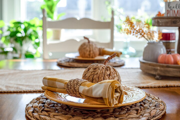 Dining room table decorated for fall