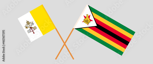 Crossed flags of Vatican and Zimbabwe. Official colors. Correct proportion