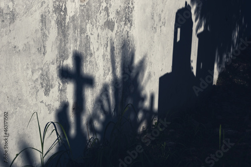 Scary abstract moonlight shadows on a cementery as concept background for Halloween